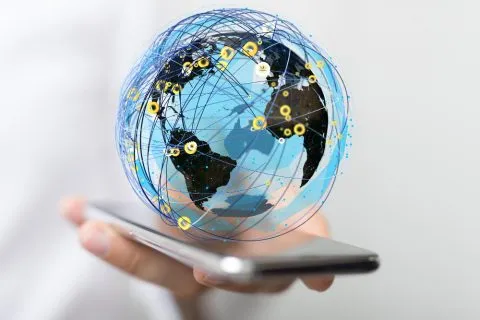 Global eSIM connectivity illustration showing a smartphone connecting to mobile networks across multiple countries through digital SIM technology and international roaming.