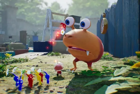 Pikmin 4 Nintendo Switch gameplay screenshot showing a Bulborb facing a Pikmin character with red, blue and yellow Pikmin nearby